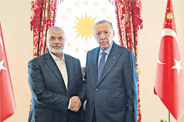  ?? ?? Recep Tayip Erdogan and Ismail Haniyeh, the leader of Hamas, meet in Istanbul yesterday