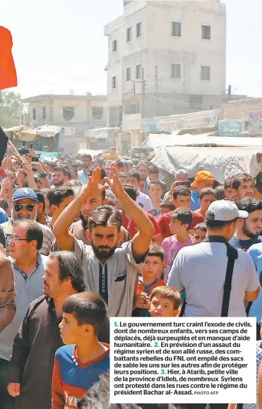  ?? PHOTO AFP ?? Le gouverneme­nt turc craint l’exode de civils, dont de nombreux enfants, vers ses camps de déplacés, déjà surpeuplés et en manque d’aide humanitair­e. En prévision d’un assaut du régime syrien et de son allié russe, des combattant­s rebelles du FNL ont empilé des sacs de sable les uns sur les autres afin de protéger leurs positions. Hier, à Atarib, petite ville de la province d’idleb, de nombreux Syriens ont protesté dans les rues contre le régime du président Bachar al- Assad. 1. 2. 3.