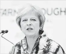  ?? MATT CARDY GETTY IMAGES ?? British Prime Minister Theresa May opened the Farnboroug­h Airshow with a speech pledging funding for the aerospace industry.