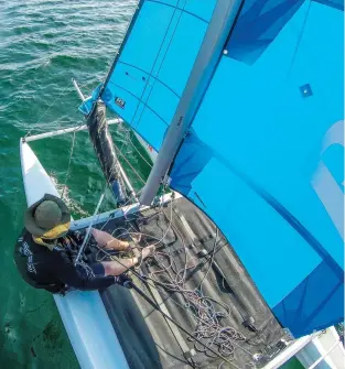  ??  ?? The 275-pound RS Cat 14XL is a big step beyond the standard roto-molded beach cat, and comes loaded with simple and durable features, including kick-up aluminum rudders, an asymmetric spinnaker and trapezes.