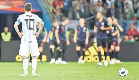  ??  ?? Argentina’s Lionel Messi waits to kick off after Croatia scored their opener during the 2018 World Cup Group D match at the Nizhny Novgorod Stadium. — AFP photo