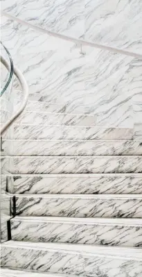  ??  ?? well-marbled: follow this staircase down to the cosmetics brand’s basement restaurant; EN HAUT, DANS LE SENS HORAIRE L’architecte Charles Mewès a construit la boutique Guerlain des Champs-élysées en 1914 ; un escalier en marbre donne accès au...