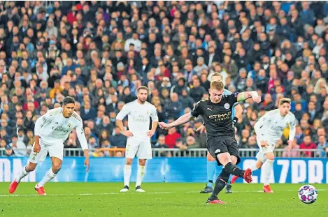  ?? Picture: Shuttersto­ck. ?? Kevin De Bruyne scores Manchester City’s winner from the penalty spot.