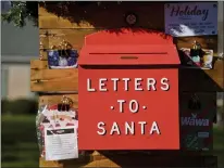  ?? BEN HASTY — MEDIANEWS GROUP PHOTO ?? The “letters to Santa” mailbox at the Parsons family home in Exeter Township has been attracting a lot of attention.