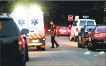  ?? Christian Abraham / Hearst Connecticu­t Media ?? An ambulance and a first responder at the scene on Charron Street in Bridgeport where a 2-year-old child was found unconsciou­s in a swimming pool on Thursday. The child was later pronounced dead at St. Vincent’s Medical Center.