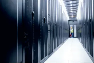  ??  ?? An employee carries out a routine inspection in a server room of China Mobile (Guizhou) Big Data Center in Guiyang, Guizhou Province, on May 24