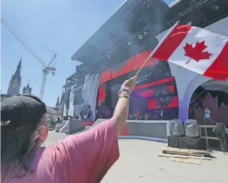  ?? JEAN LEVAC ?? Paige Runolsson enjoys the rehearsal for the Canada Day festivitie­s on Parliament Hill Thursday.