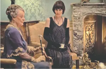  ?? JAAP BUITENDIJK/FOCUS FEATURES VIA AP ?? Dame Maggie Smith and Michelle Dockery appear in “Downton Abbey.”