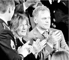 ??  ?? File photo of Warmbier’s parents, Fred and Cindy applauding as Trump talks about the death of their son Otto after his arrest in North Korea during the State of the Union address to a joint session of the US Congress on Capitol Hill in Washington, US —...