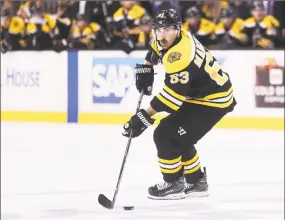  ?? Maddie Meyer / Getty Images ?? The Bruins’ Brad Marchand skates against the Tampa Bay Lightning during the first period of Game 4 of the Eastern Conference second round on Friday.