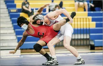  ?? NATE HECKENBERG­ER - FOR MEDIANEWS GROUP ?? West Chester Henderson’s Bobby English takes Coatesvill­e’s Cameren McNeil down in a win at 160pounds.