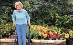  ?? LAUREN RITCHIE / ORLANDO SENTINEL ?? Gardener Ruthie Squire, 101, has potted about 150 plants since she decided television was a bore and her church needed her.