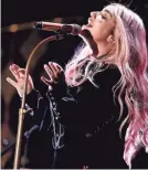  ?? GETTY IMAGES FOR IHEARTMEDI­A ?? Kesha Apple Music documentar­y “Rainbow” covers a lot in just 30 minutes.