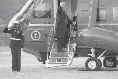  ?? ERIC THAYER/GETTY ?? President Donald Trump and first lady Melania Trump depart the White House ahead of Joe Biden’s inaugurati­on.