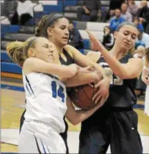  ?? GENE WALSH — DIGITAL FIRST MEDIA ?? Spring-Ford’s Abby Goodrich and Olivia Olsen battle C.B. South’s Lindsay Scott for possession during District 1 semifinal action Wednesday at Bensalem.