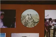  ?? Lea Suzuki / The Chronicle ?? A childhood photo of author Jaime Cortez (left) and his sister in a potato field hangs in his home.