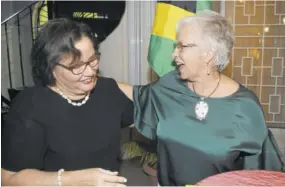  ??  ?? Dr Rosemary Moodie (left) enjoyed a joke with long-time friend Dr Carolyn Gomes, with whom she attended St Hugh’s High School.