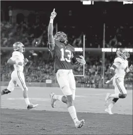  ?? NHATV. MEYER/STAFF ?? Stanford’s Alijah Holder celebrates his 31-yard intercepti­on return for a touchdown in the first quarter against UCLA. Holder took full advantage of a poor pass by Josh Rosen.