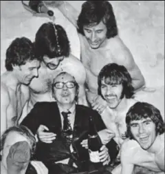  ??  ?? Fearless defender: Garner, seen pouring champagne on Eric Morecambe at Luton, was also a Watford favourite