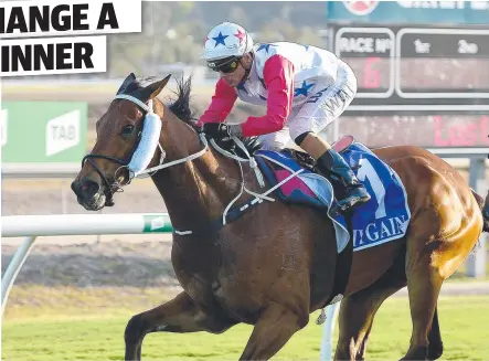  ?? Picture: MATT TAYLOR ?? KICKING ON: The Jamie Mcconachy-trained Friendly Dragon is guided across the line by jockey Wanderson D'avila for a win in the Brown Brothers Family Wine Makers Open Handicap (1200m) at Cluden Park yesterday.