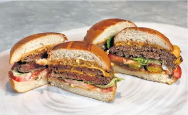  ?? Associated Press file photo ?? Soy leghemoglo­bin, which the FDA has approved as a color additive, gives Impossible Foods’ meatless burger its color.