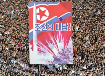  ??  ?? A picture taken on September 23 shows an anti-U.S. rally in Pyongyang's Kim Il Sung Square.