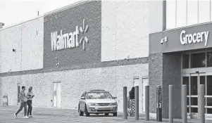  ?? KEN BLEVINS/WILMINGTON STAR NEWS FILE ?? A Walmart store in Shrewsbury, a suburb of St. Louis, has begun converting self-checkout lanes to “traditiona­l checkout lanes,” Walmart spokespers­on Briand Little said in a statement to USA TODAY.