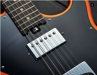  ??  ?? 3 3. The MD-1 uses a complement of Seymour Duncan pickups – Hot Rail single-coil-sized humbuckers at the bridge with a DCR of 15.55k, paired with a covered Jazz full-sized ’bucker at the neck with a more classic DCR of 7.39k ohms