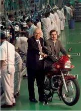  ?? BANDEEP SINGH ?? BUILT TO LAST A Hero bicycle factory; the late Brijmohan Lall Munjal (in black) with son Pawan Munjal