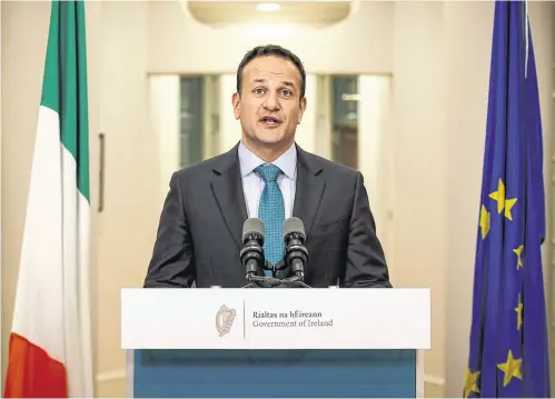  ?? PHOTO: MARK CONDREN ?? Historic: Taoiseach Leo Varadkar addresses the nation from Government Buildings.