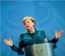  ??  ?? Cancellier­a
Merkel ieri in conferenza stampa, prima della notizia della quarantena