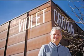  ?? LUIS SÁNCHEZ SATURNO/THE NEW MEXICAN ?? Bill Banowsky, who runs Violet Crown Cinema, outside the theater on Dec. 16. ‘The whole art of going to the movies is lost,’ he says.