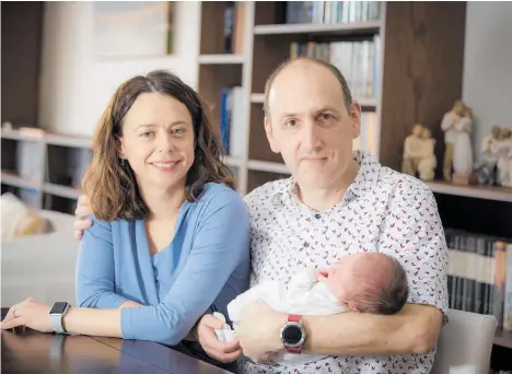  ?? Photo / Michael Craig ?? Irene Direnko-Smith, here with husband Jolyon, is too nervous to take out their week-old son, Lieve.