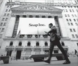  ?? Drew Angerer Getty Images ?? SNAP’S employee-shareholde­rs become free to sell about $4 billion worth of holdings for the first time Aug. 14. Above, the New York Stock Exchange in March.