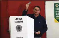  ?? - Reuters/Ricardo Moraes ?? CASTING BALLOT: Jair Bolsonaro, far-right lawmaker and presidenti­al candidate of the Social Liberal Party (PSL), casts his vote in Rio de Janeiro, Brazil October 7, 2018.