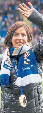  ?? Picture: SNS. ?? Eve shows off her Olympic medal to fans at McDiarmid Park in 2014.