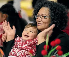  ?? AIMAN AMERUL MUNER/STUFF ?? Vea Saulala and his grandmothe­r Ofa Saulala enjoy the Tonga Day celebratio­ns.