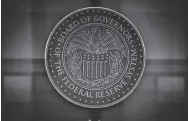  ?? Bloomberg News ?? This December 19, 2021, shows a photo of the seal of the Federal Reserve system. Global bonds rallied as investors watched closely how inflation and the Us Fed response create ripples in the market.