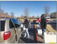  ?? (Courtesy Photo) ?? “We had a wonderful morning serving our neighbors at the First Presbyteri­an Church Food Pantry” on Nov. 19, says the Rev. Katie Cummings, pastor of the First Presbyteri­an Church of Bentonvill­e. “Volunteers distribute­d 176 turkeys. We had planned for 150, but we still had a line of cars, so we went out and got more! We also gave out stuffing, cranberrie­s and mashed potatoes, as well as the usual distributi­on of pantry, produce and personal care items. There was lots of sunshine and smiles all around. A beautiful day, and we are so grateful.”