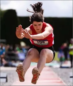  ??  ?? Grace Furlong of C.B.S. New Ross on her way to winning triple jump gold.