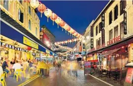  ?? Photo courtesy of Singapore Tourism Board ?? A Chinatown street scene in Singapore