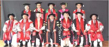  ??  ?? Members of the University Council and Board of Directors pose for a formal portrait after the proceeding­s. Seen here are (seated from second left) Morshidi, Dix, Abang Johari, Kristjanso­n and Wilson.