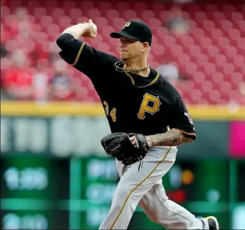  ?? Gary Landers/Associated Press ?? Starting pitcher A.J. Burnett struck out seven and gave up just four hits in his first outing of the season Thursday in Cincinnati.