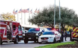  ?? Karen Warren/Staff photograph­er ?? Houston police and Harris County sheriff ’s deputies converge outside of Lakewood Church on Feb. 11 in response to a report of a shooting there.