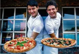  ?? PAT GREENHOUSE/GLOBE STAFF (LEFT); GLOBE FILE (RIGHT) ?? A pepperoni pizza made by chef Brian Kevorkian at Source in Cambridge. Right: Dario and Claudio Paone, pictured in 2004.