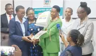  ?? ?? Primary and Secondary Education Deputy Minister Angeline Gata (centre) launches the Zimbabwe Early Learning Policy in Kadoma yesterday while officials from the ministry and developmen­t partners look on