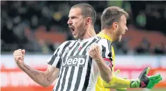  ?? AP ?? Juventus’ Leonardo Bonucci celebrates with goalkeeper Neto.
