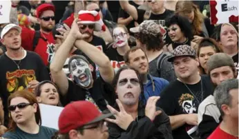  ?? PABLO MARTINEZ MONSIVAIS /THE ASSOCIATED PRESS ?? Juggalos, as supporters of the rap group Insane Clown Posse are known, gather in Washington at Saturday’s rally.