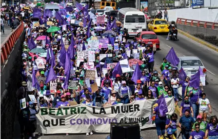  ?? — AFP file photo by Marvin Recinos ?? Demonstrat­ors march in support of abortion and other women’s rights in San Salvador, on Internatio­nal Women’s Day.