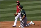  ?? MATT YORK — THE ASSOCIATED PRESS ?? The A’s Matt Olson rounds the bases after hitting a tworun homer against the Angels on Saturday.